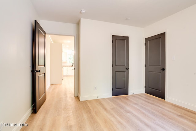 unfurnished bedroom featuring light hardwood / wood-style flooring