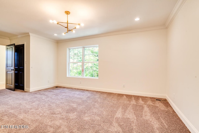 empty room with crown molding, carpet flooring, and a notable chandelier