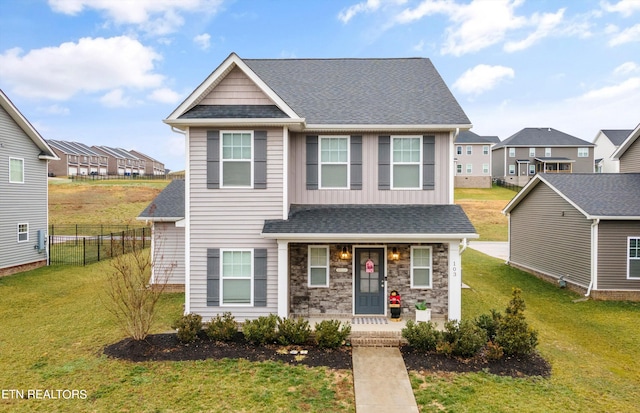 view of front of house featuring a front lawn