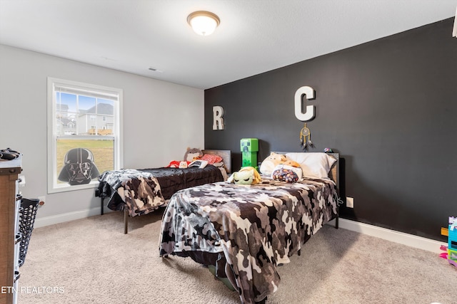 bedroom featuring carpet flooring