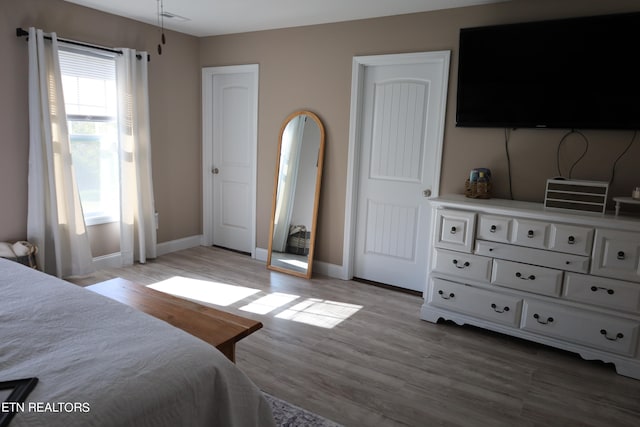 bedroom featuring light hardwood / wood-style flooring