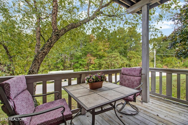deck featuring outdoor dining space