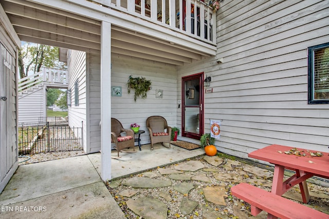 view of patio with a balcony