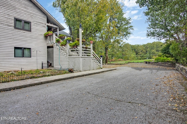 view of home's exterior featuring stairway