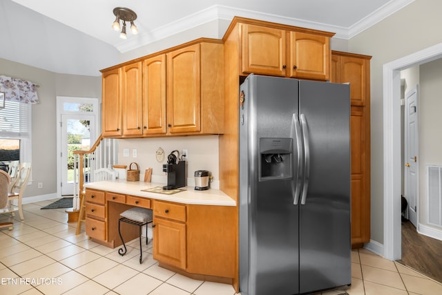 kitchen featuring crown molding, light tile patterned flooring, stainless steel fridge with ice dispenser, and an inviting chandelier