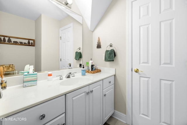 bathroom with vanity and tile patterned floors