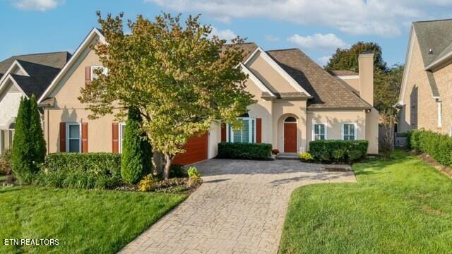 view of front of home with a front yard