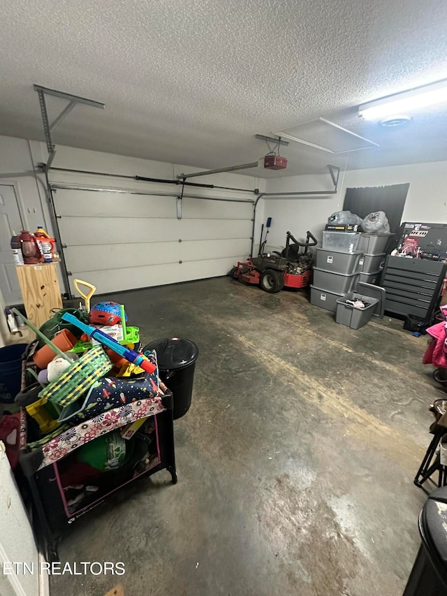 garage featuring a garage door opener