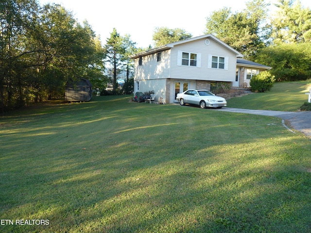 exterior space featuring a front yard