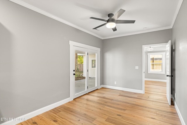 unfurnished room featuring ornamental molding, light hardwood / wood-style flooring, and ceiling fan