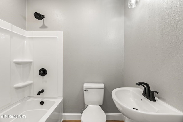 full bathroom with shower / bathtub combination, sink, and toilet