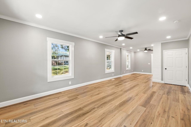 unfurnished living room with ornamental molding, light hardwood / wood-style flooring, and ceiling fan