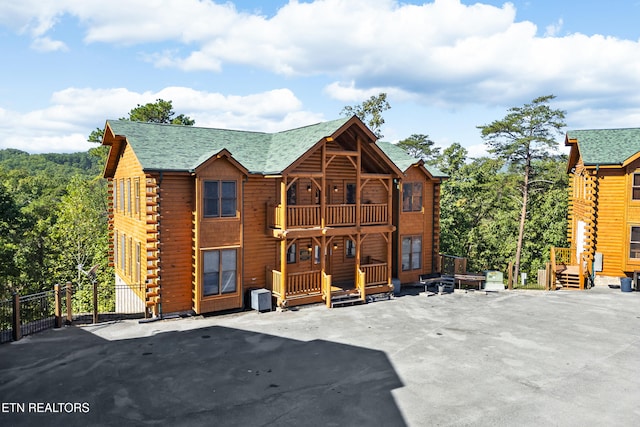 cabin featuring a balcony