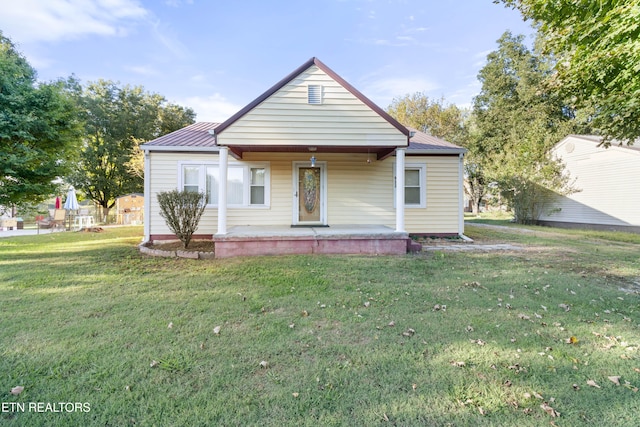 bungalow with a front lawn