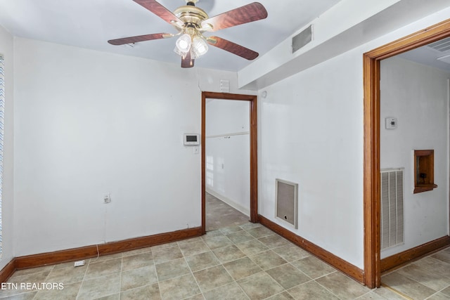 empty room featuring ceiling fan