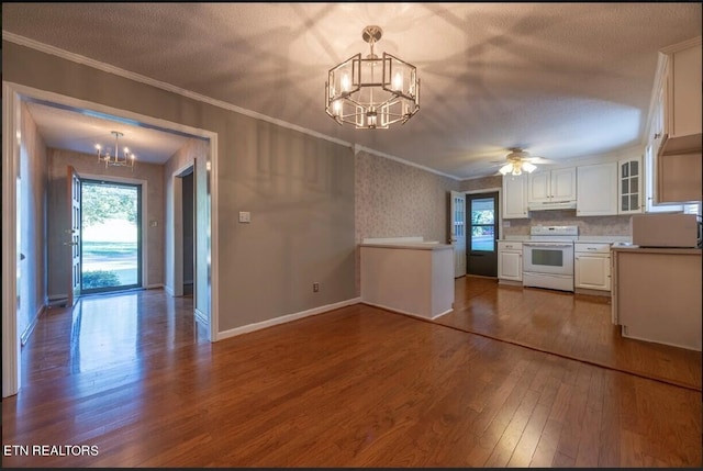 kitchen with white cabinets, a textured ceiling, wood-type flooring, pendant lighting, and white range oven