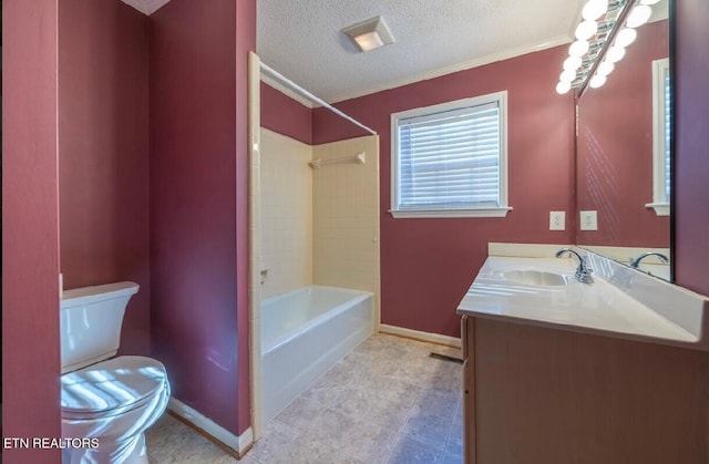 full bathroom with toilet, a textured ceiling, vanity, and washtub / shower combination