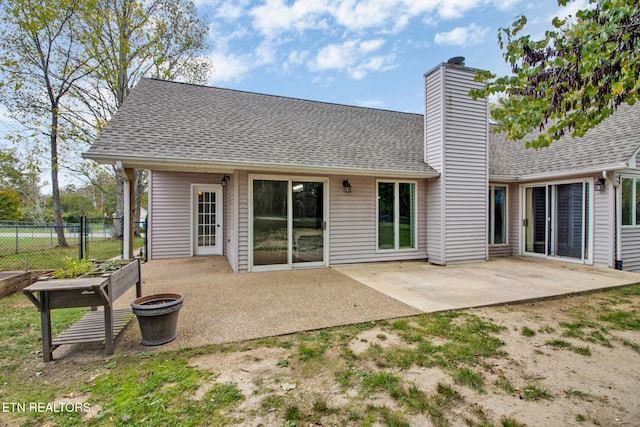 rear view of property with a patio