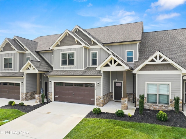 craftsman-style house with a garage