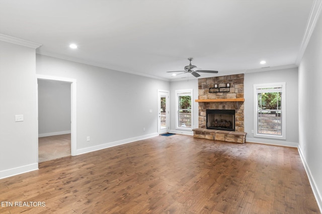 unfurnished living room with crown molding, hardwood / wood-style flooring, and ceiling fan