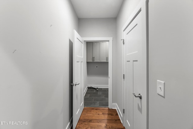 hallway featuring dark hardwood / wood-style flooring