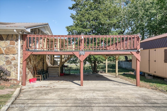 view of vehicle parking featuring a carport