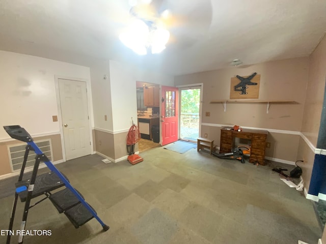 miscellaneous room with carpet floors