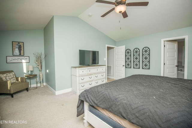 carpeted bedroom with lofted ceiling, ceiling fan, and connected bathroom