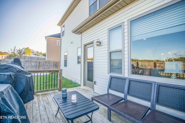 wooden terrace with area for grilling