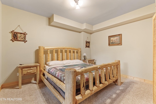 bedroom featuring carpet