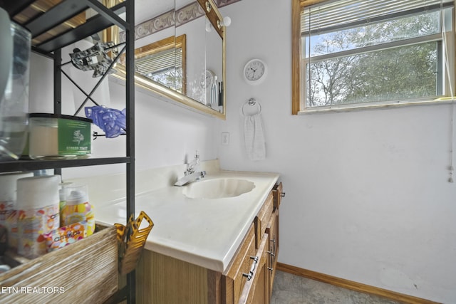 9832 Clift Rd, Strawberry Plains, TN 37871 - bathroom with vanity and baseboards