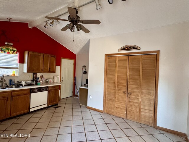 9832 Clift Rd, Strawberry Plains, TN 37871 - kitchen with light tile patterned floors, a ceiling fan, dishwasher, light countertops, and a sink
