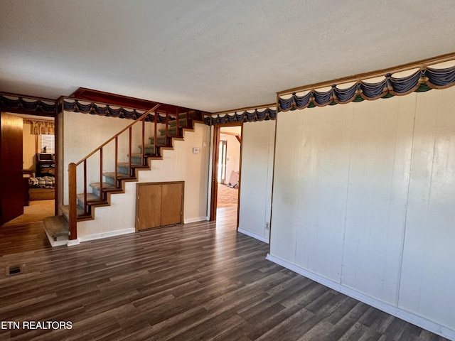 9832 Clift Rd, Strawberry Plains, TN 37871 - interior space with stairway, dark wood-type flooring, and baseboards