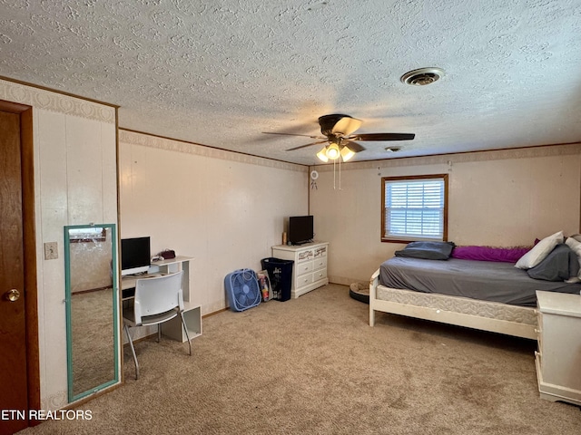 9832 Clift Rd, Strawberry Plains, TN 37871 - carpeted bedroom featuring crown molding, a ceiling fan, visible vents, and a textured ceiling