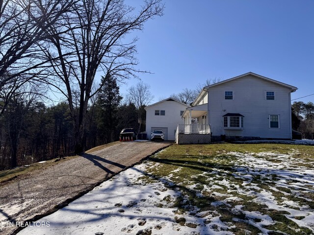 9832 Clift Rd, Strawberry Plains, TN 37871 - view of front of house featuring driveway and an attached garage