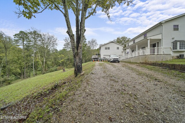 9832 Clift Rd, Strawberry Plains, TN 37871 - exterior space with driveway and covered porch