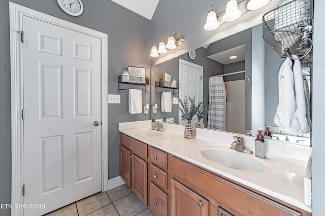 bathroom featuring tile patterned floors and vanity