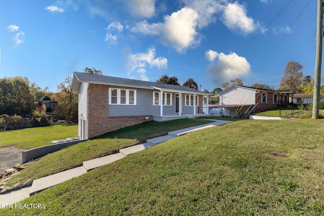 view of front facade with a front yard