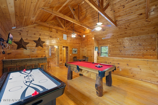 playroom with wooden walls, ceiling fan, wooden ceiling, light hardwood / wood-style floors, and pool table