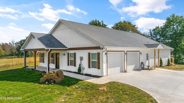 modern farmhouse style home with a garage and a front lawn