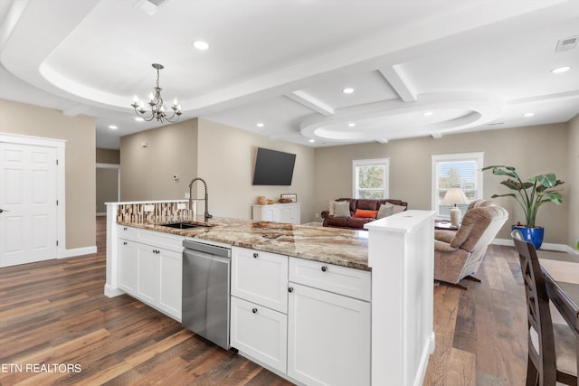 kitchen featuring decorative light fixtures, stainless steel dishwasher, dark hardwood / wood-style floors, and white cabinets