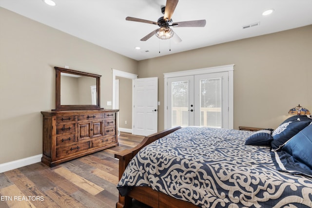 bedroom featuring access to exterior, ceiling fan, dark wood-type flooring, and french doors