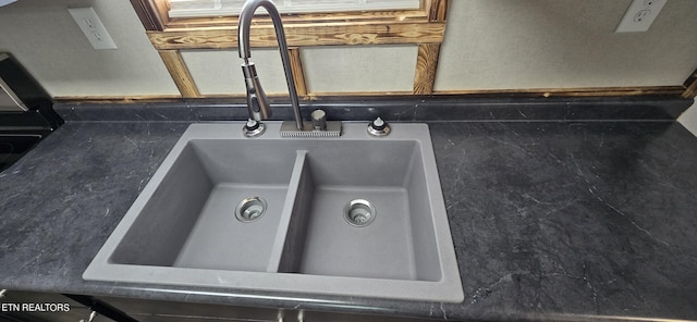 details with sink and decorative backsplash