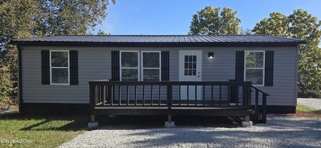 view of front of house featuring a deck