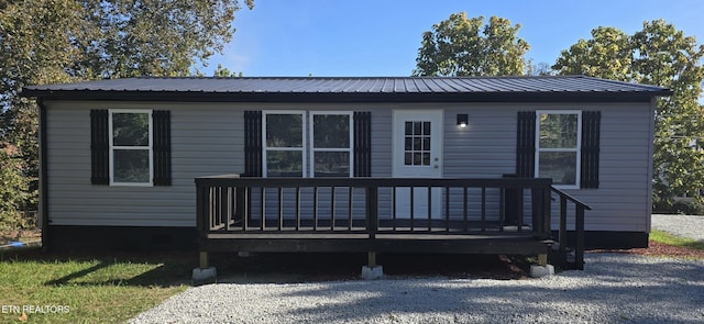 view of front of house featuring a deck