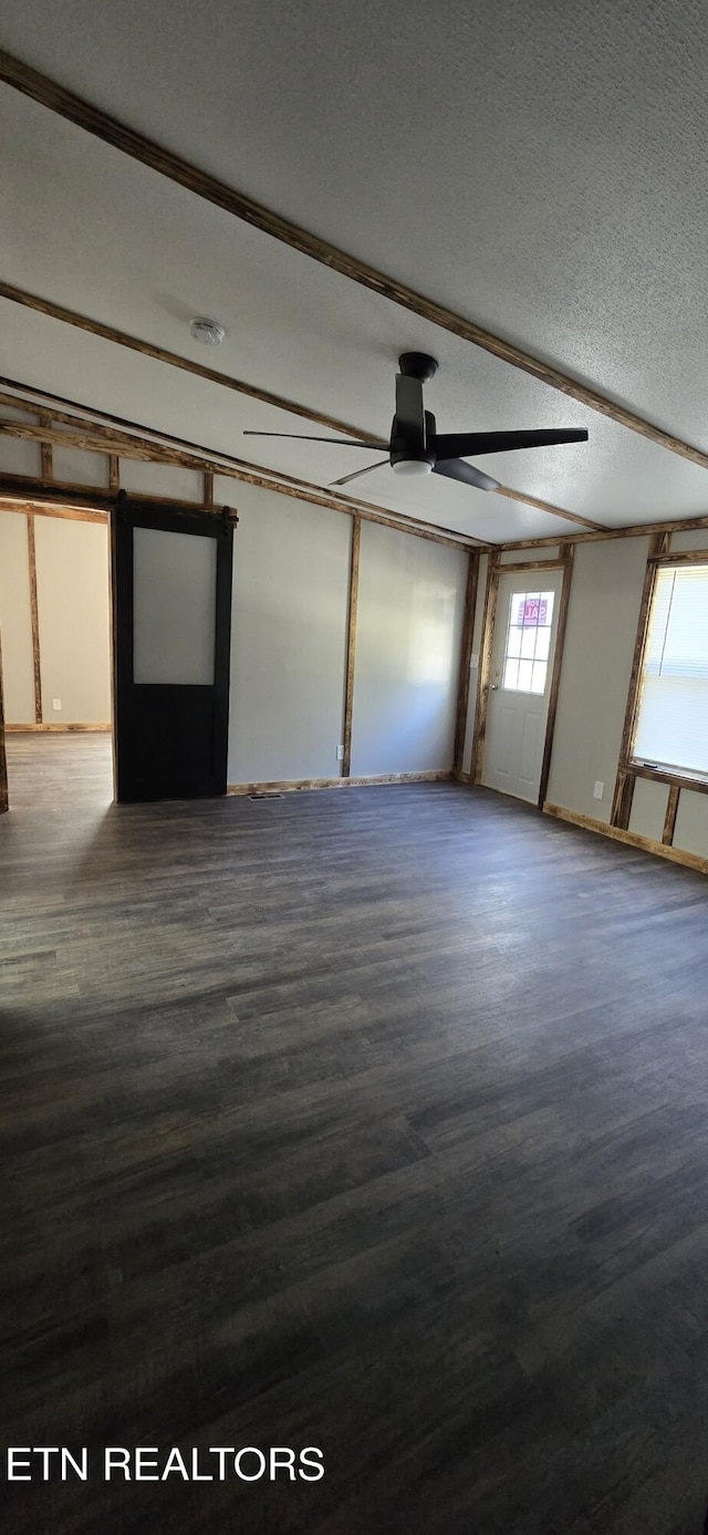 spare room featuring ornamental molding, a textured ceiling, hardwood / wood-style flooring, and ceiling fan