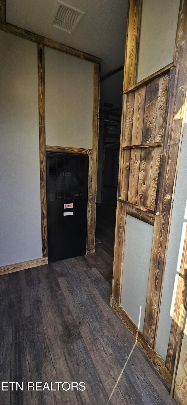 interior space with dark wood-type flooring