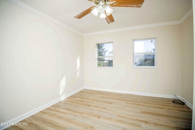 empty room with ceiling fan, light hardwood / wood-style flooring, and ornamental molding