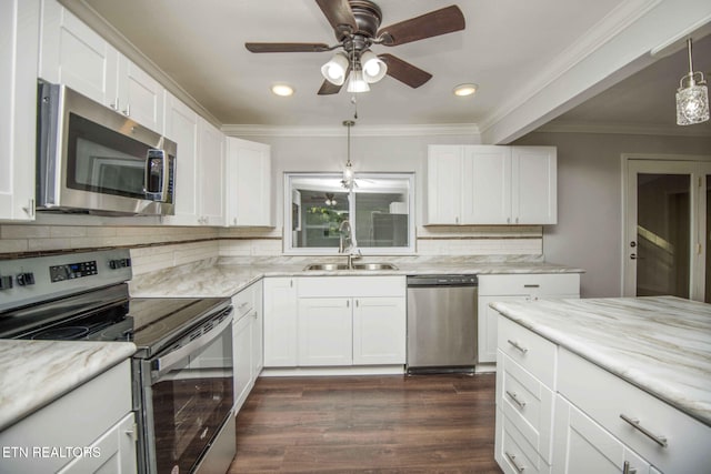 kitchen with sink, white cabinets, and stainless steel appliances