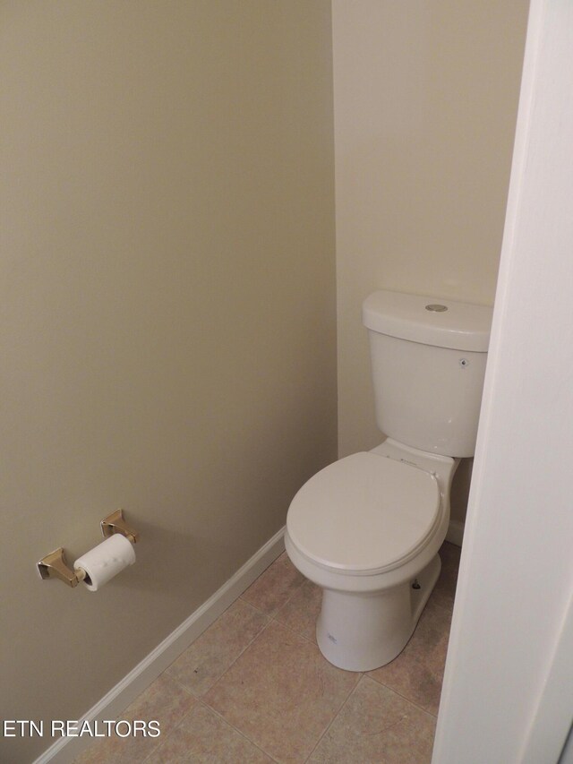 1432 Pheasants Glen Dr, Knoxville, TN 37923 - bathroom with toilet, baseboards, and tile patterned floors